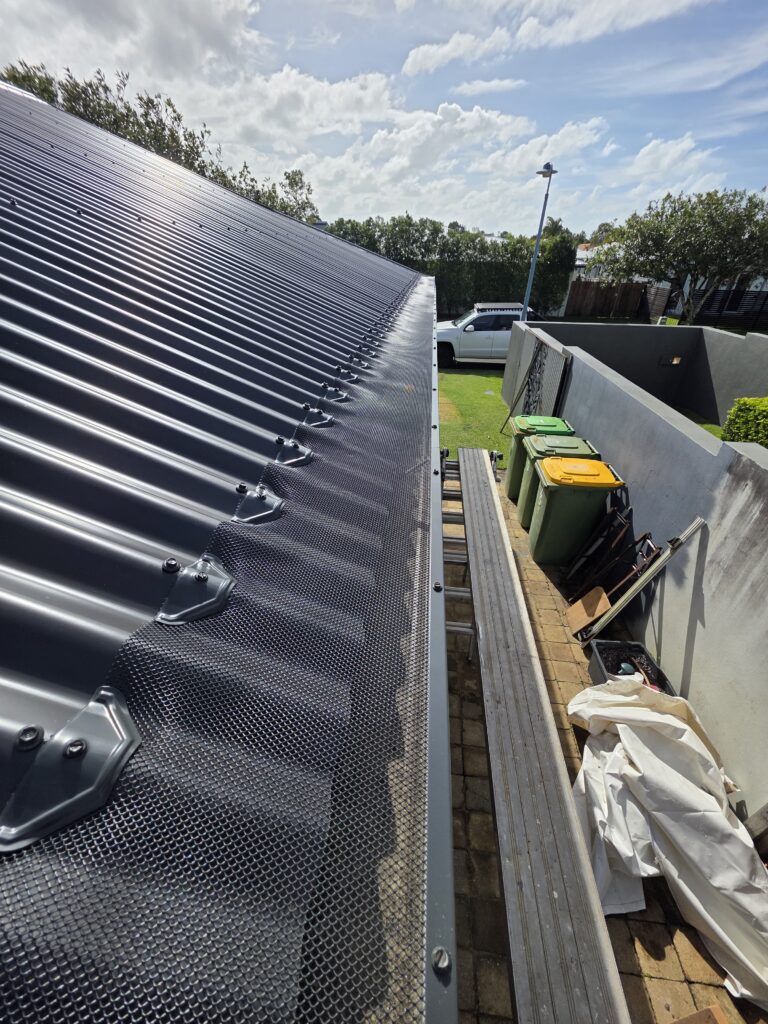 4mm Aluminium Gutter Guard Installation 4mm aluminium gutter guard installation Sunshine Coast on Colorbond roof.
