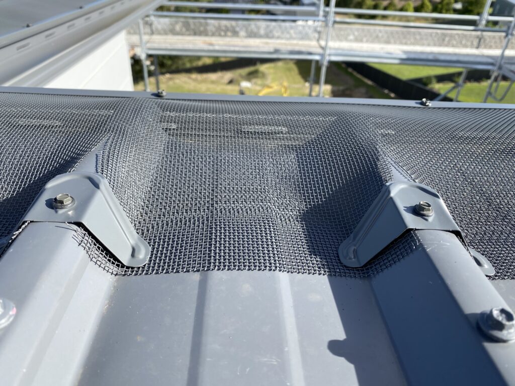 2mm Woven Aluminium Gutter Guard Installation 2mm woven aluminium gutter guard installation Sunshine Coast on Colorbond roof.